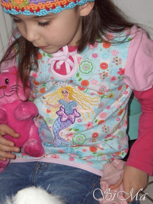 Was eine Nixe, ein Frosch und