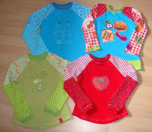 4 kunterbunte Kindershirts :)