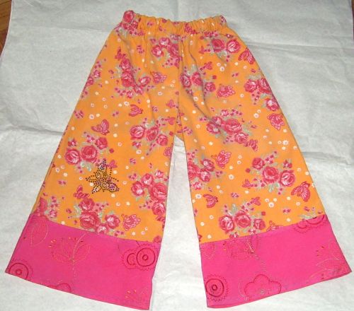 Stiefelhose mit Glitzerschmetterling