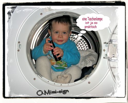 Kind im Trockner