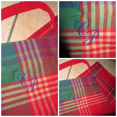 ein Monogramm ~ auf Sch�rze und Handt�cher gestickt