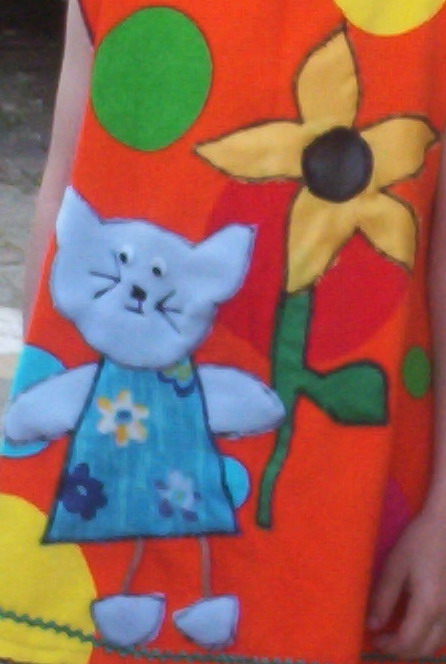 Katze mit Sonnenblume