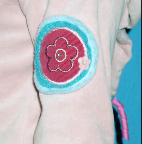 rmel-Detail zum Maus-Pulli