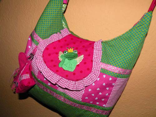 Poppig bunte Froschtasche