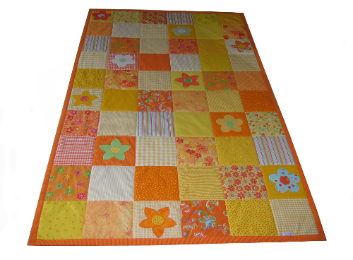 gelb-orange Patchworkdecke