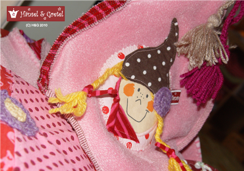 Zipfelmtze und Patchworkschal