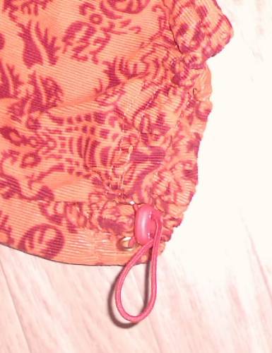 Hosen-Detail Kombi in Orange