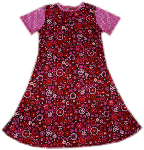 Olivia mit Kreiseln und Blumen